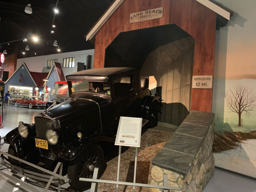 Recreated covered bridge with a Model T crossing it at the AACA Museum