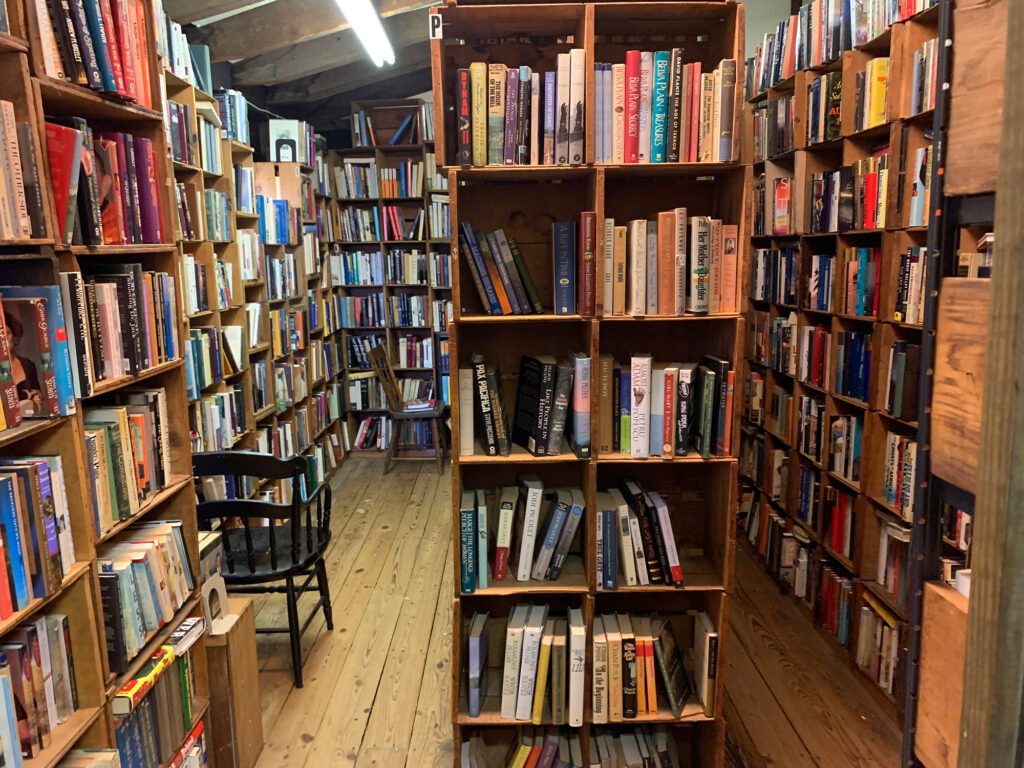 Rows of books on floor-to-ceiling shelves at Baldwin's Book Barn