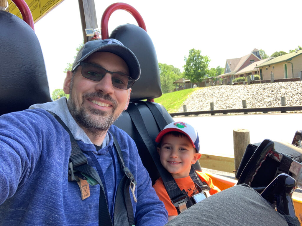 selfie of a man and his young son a go-kart at Bear Rock Junction
