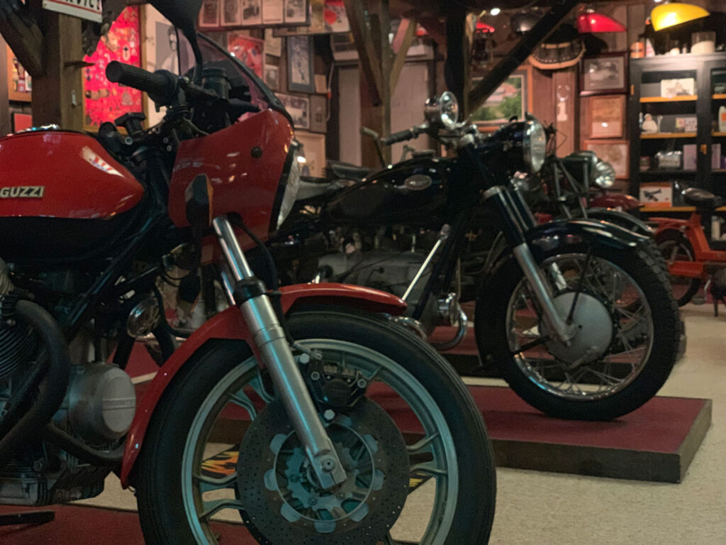 Row of classic motorcycles at Bill's Old Bike Barn