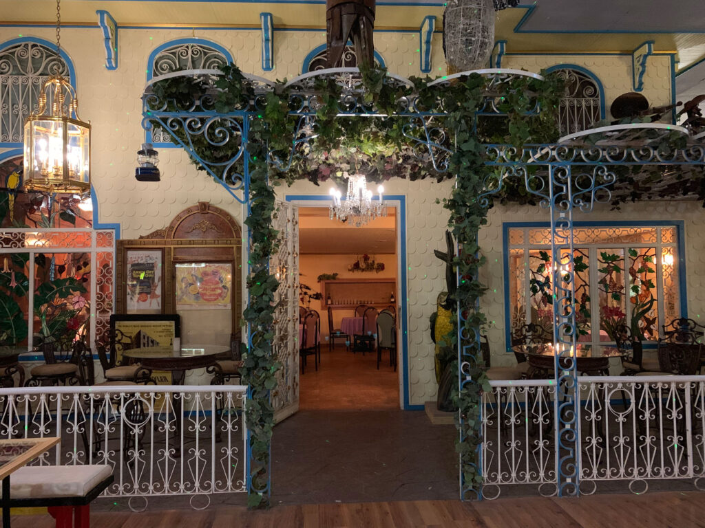 Recreated restaurant inside Bill's Old Bike Barn made to look like a streetside cafe in New Orleans