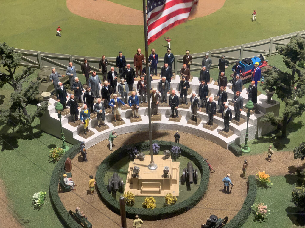 Figurines of every US President standing on a bleacher at the Choo Choo Barn