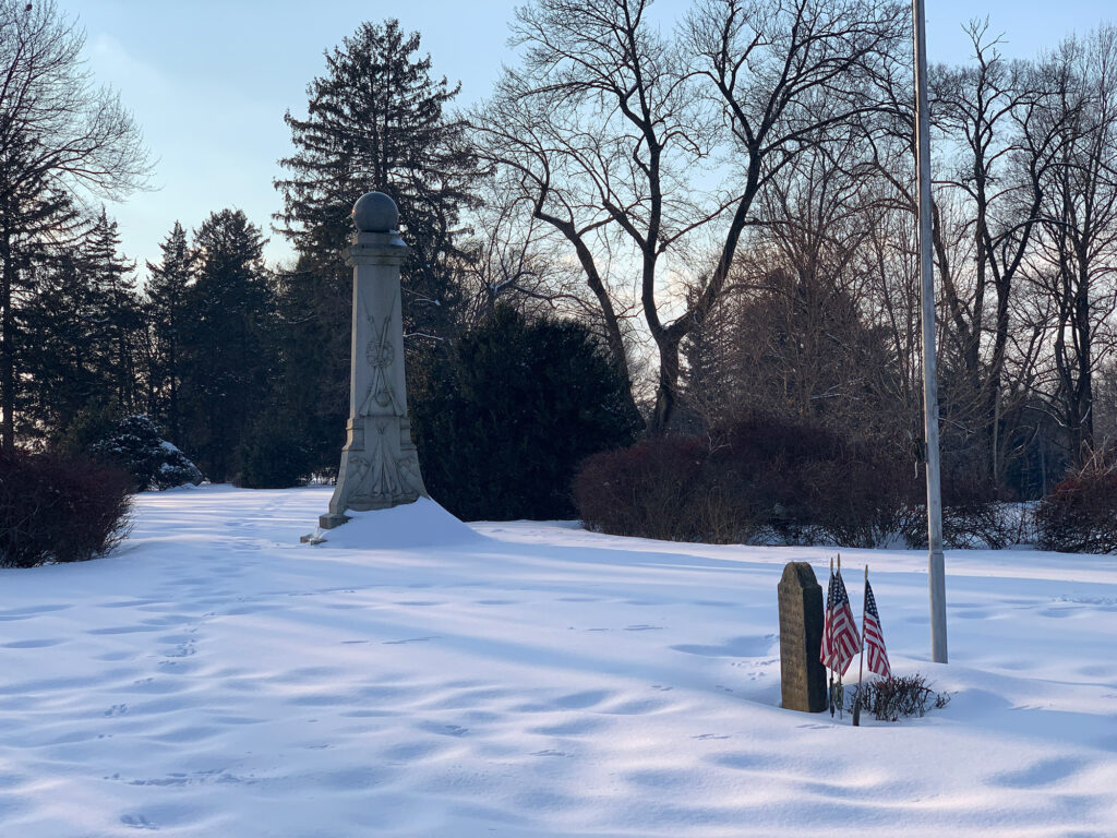 Stone obelisk and gravestones at the Conrad Weiser Homestead in Womelsdorf, PA