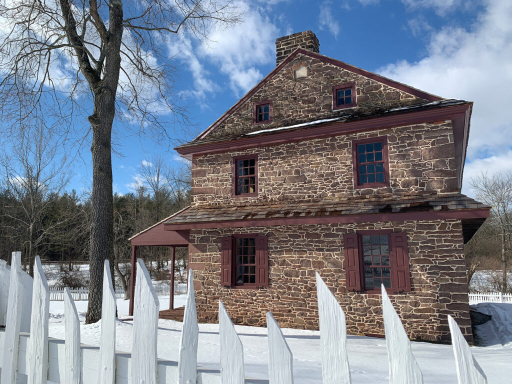 the Boone House at Daniel Boone Homestead on a snowy day 