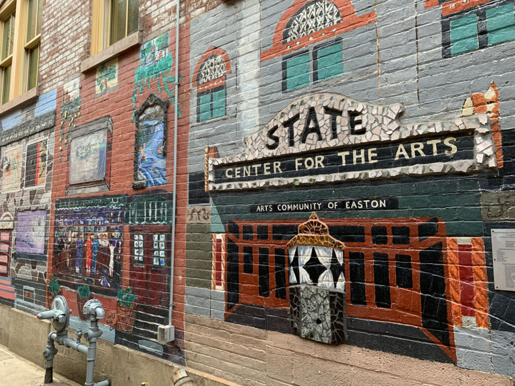 Mural on a brick wall in Easton depicting the State Theater