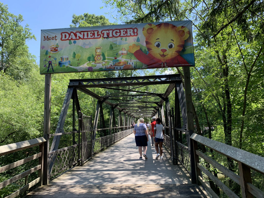 bridge with a sign for Daniel Tiger's Neighborhood at Idlewild