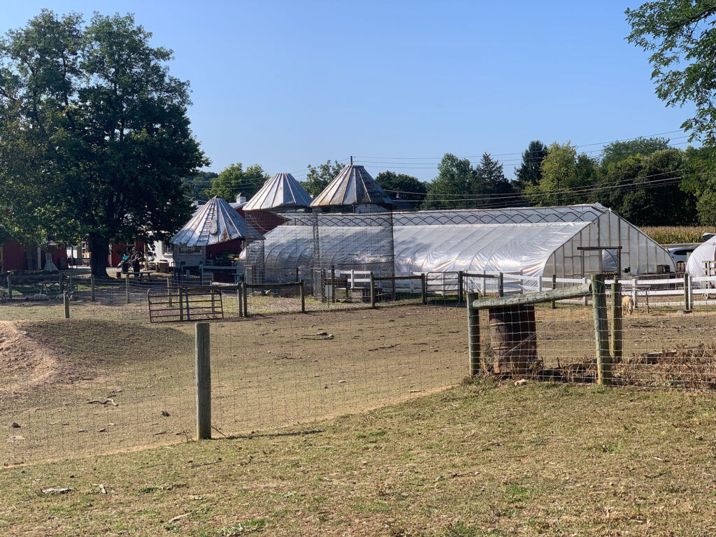 barns and field of Paulus Farm Market