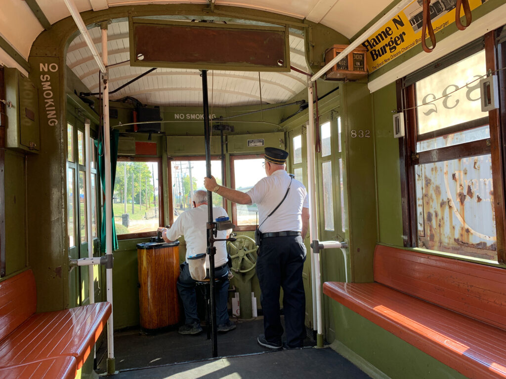 guide driving a streetcar at the Pennsylvania Trolley Museum