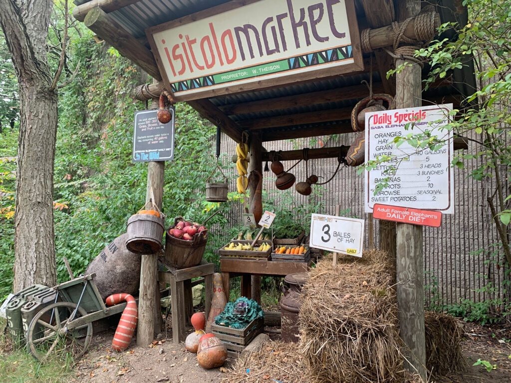 Recreated market stand showing how much food an elephant eats in a day