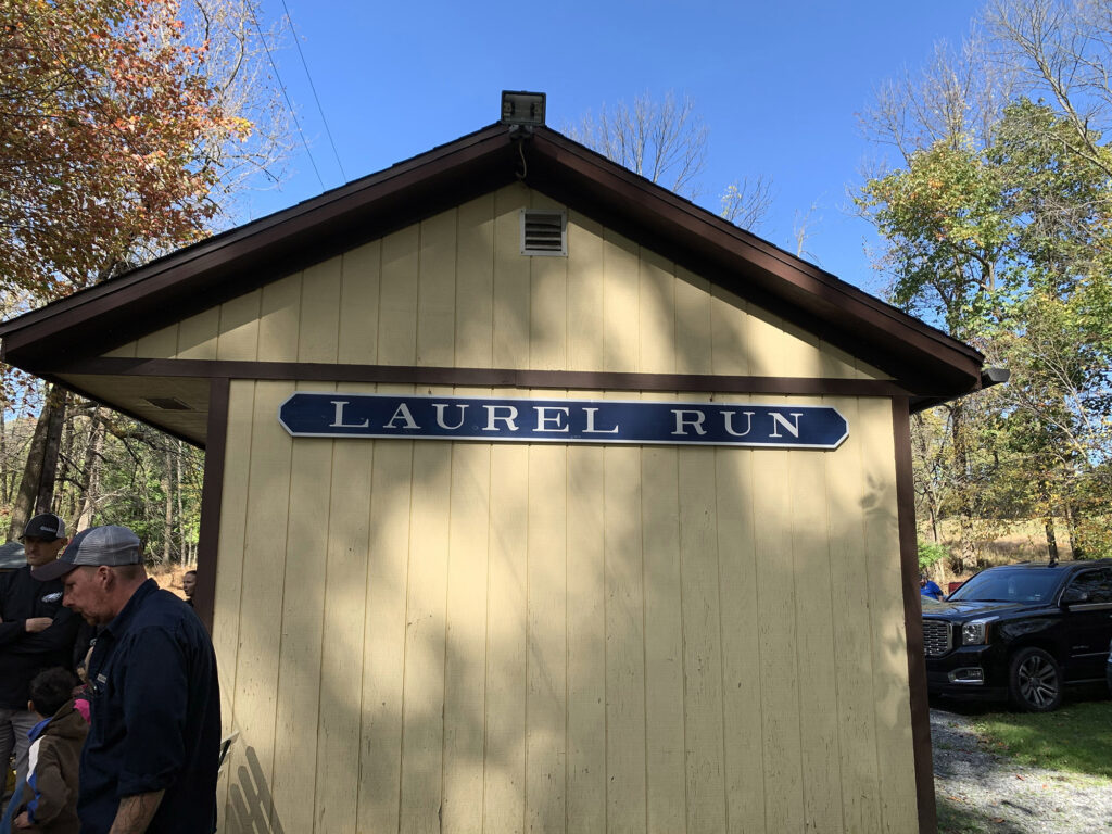 Trackside railroad shanty with a sign reading "Laurel Run"