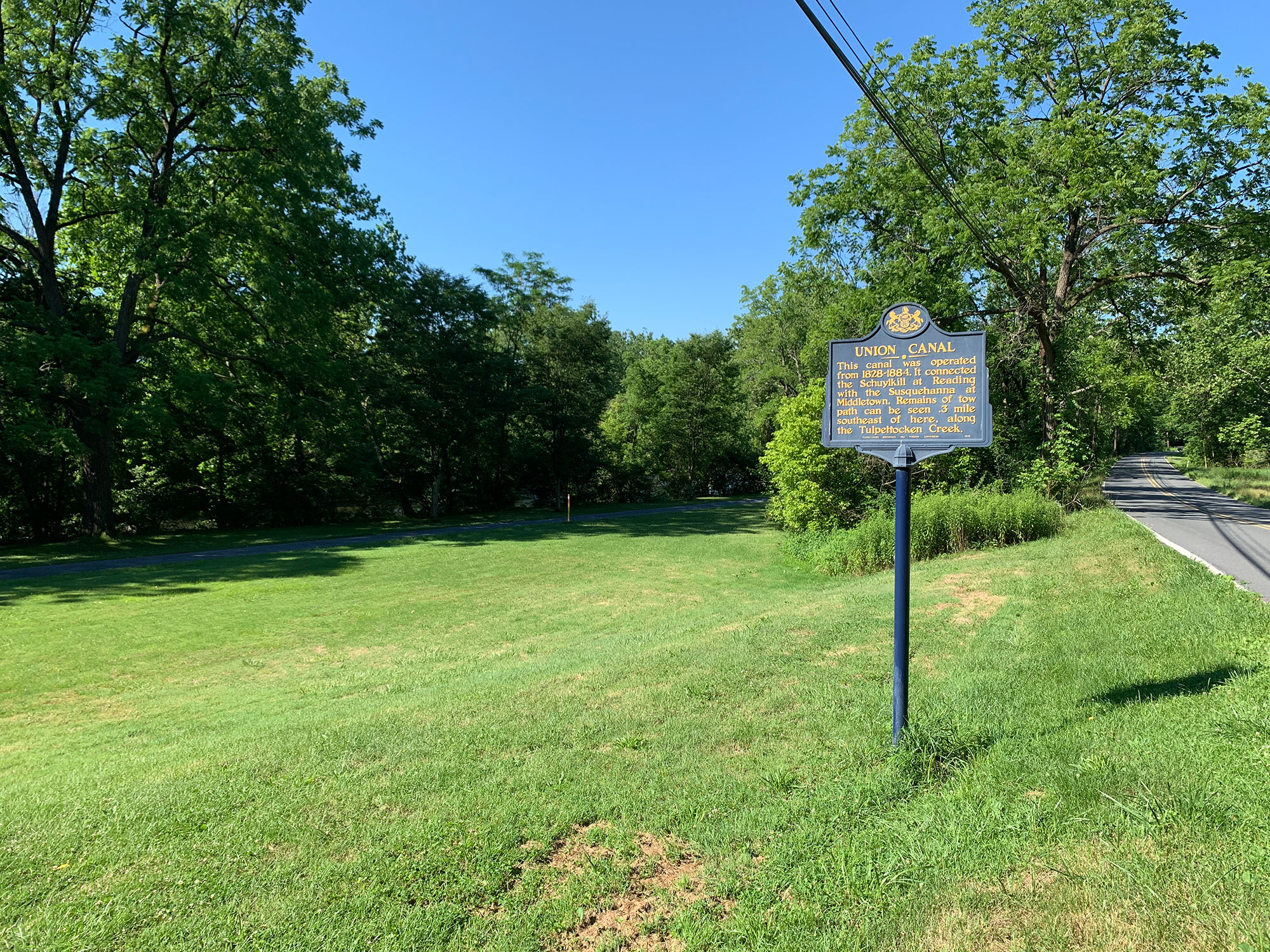 blue historical marker for the Union Canal Trail