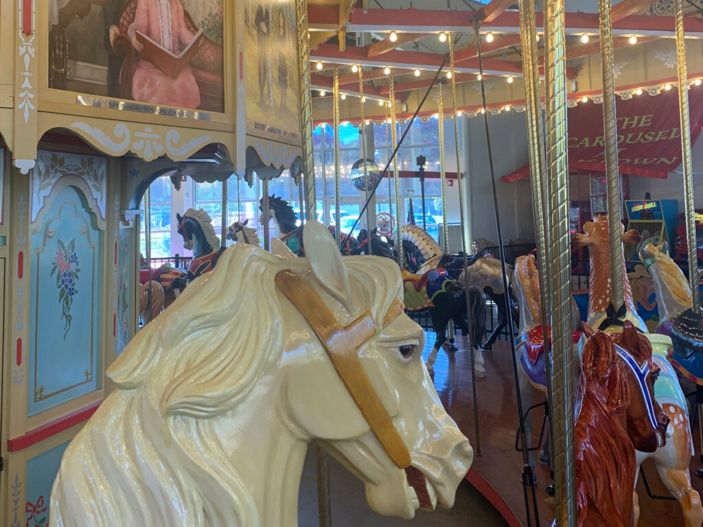 A carved horse painted white on the Carousel at Pottstown