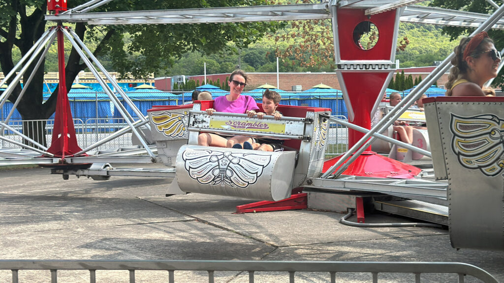 mother and son ride the scrambler at Delgrosso's Amusement Park