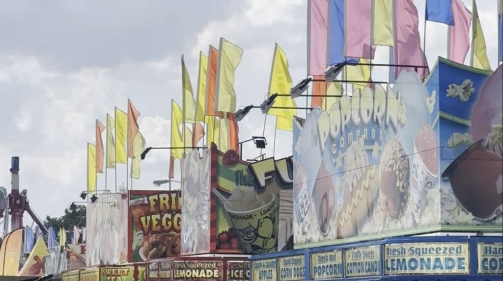 large signs advertising fried foods and items at the Lebanon Fair