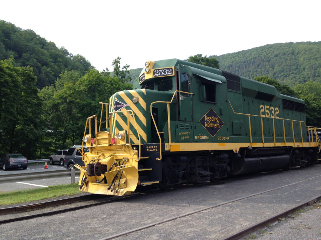 Green and yellow diesel locomotive on the tracks near Jim Thorpe, PA