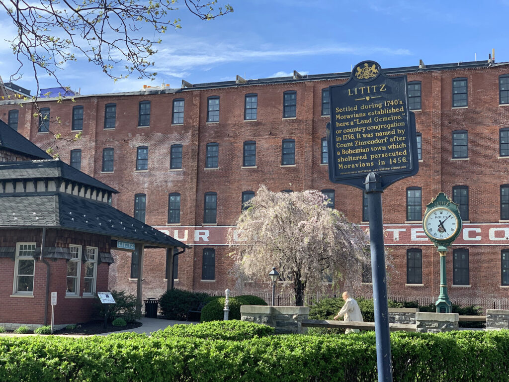 historical marker for Lititz, PA in front of the former Wilbur Chocolate Factory