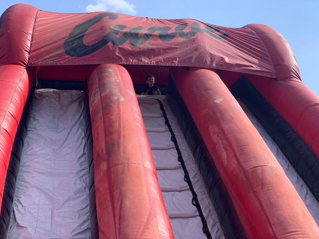 large inflatable slide with the logo for the Altoona Curve at the top