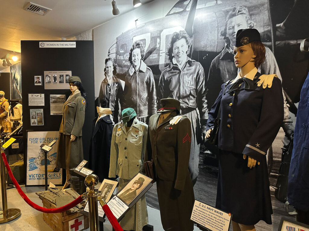 display showcasing manequins of women in military uniform