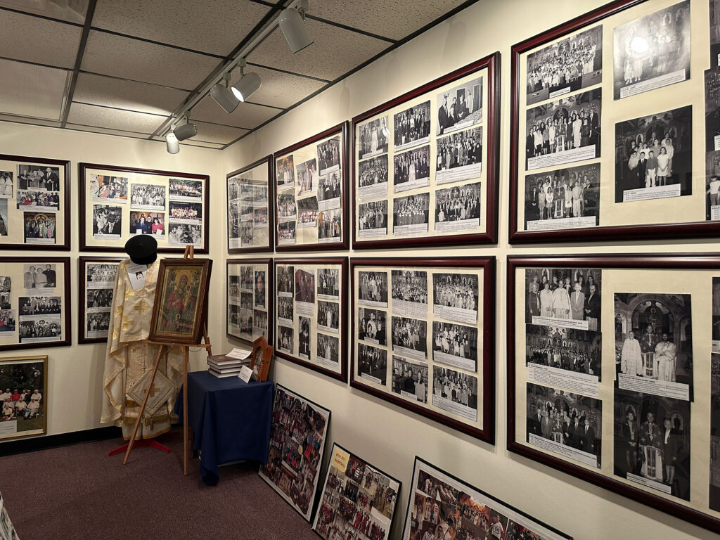 Wall filled with frames with four to six photos in each frame at Sts. Constantine & Helen Church in Reading, PA.