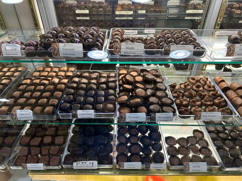 display case full of assorted chocolates at Highland Chocolates on Main Street in Wellsboro, PA