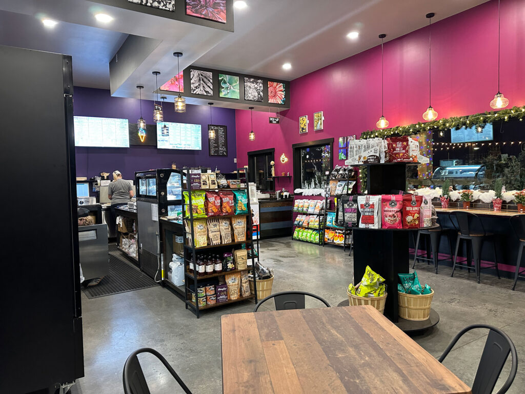Interior of Hume's Blooms in Wellsboro looking from the seating area to the cafe