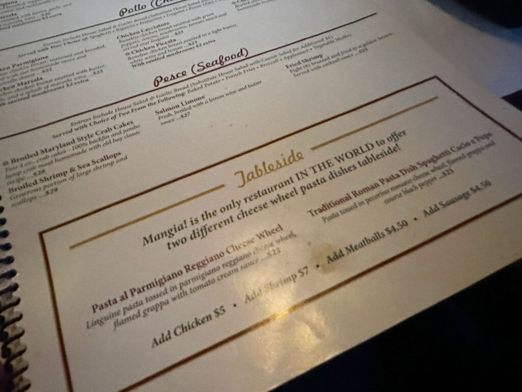 section of the menu for Mangia Italian Restaurant in Mohnton, PA with descriptions of tableside cheese wheels
