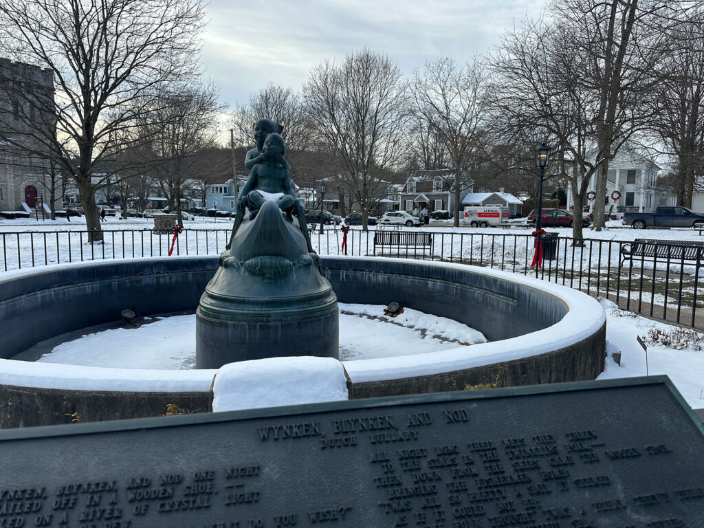 statue of Wynken, Blynken, and Nod in the center of the Green in Wellsboro, PA