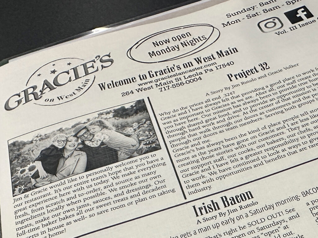 restaurant menu made to look like a newspaper with the name "Gracie's" at the top