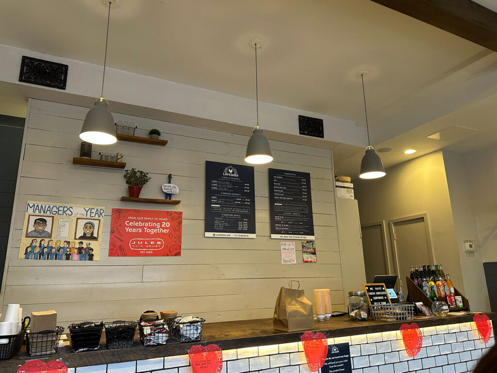 order counter with two verticle blackboards showing the menu at Lovebird in Doylestown