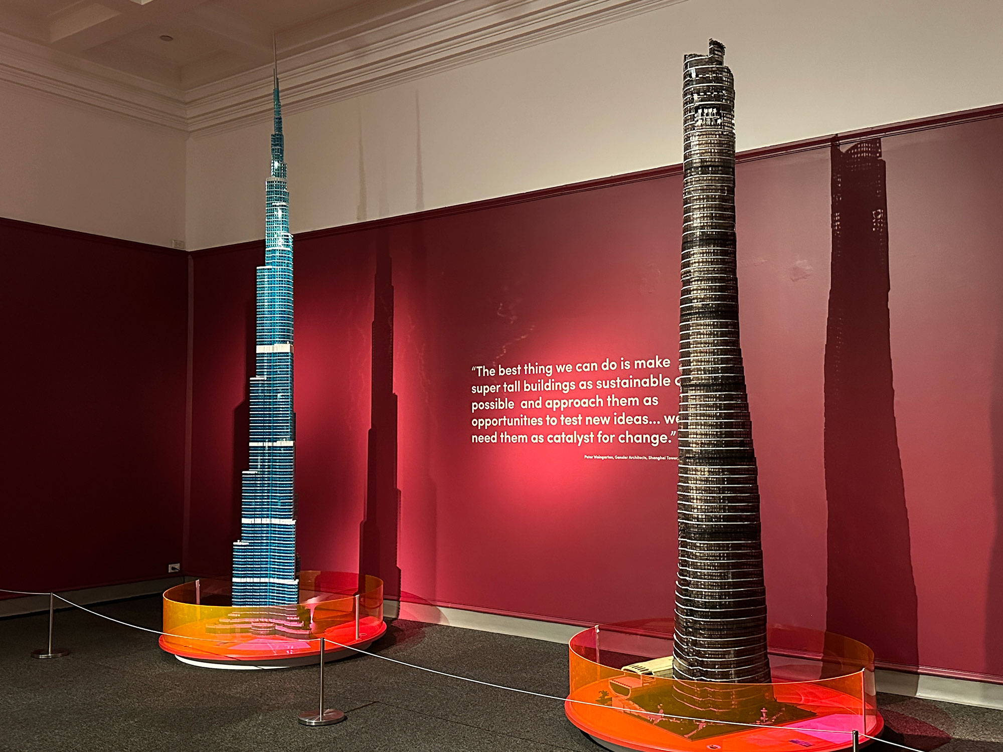 Two LEGO skycrapers - one blue, one black and gray - on display at the Reading Public Museum