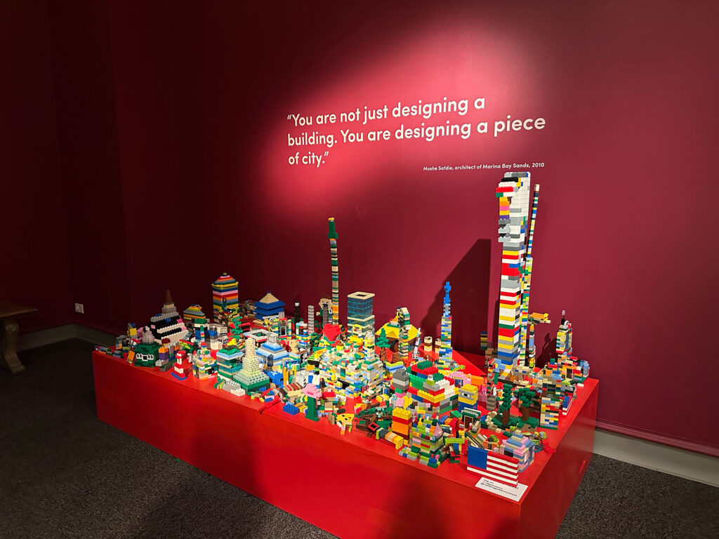 red table filled with LEGO towers built by visitors the Reading Public Museum