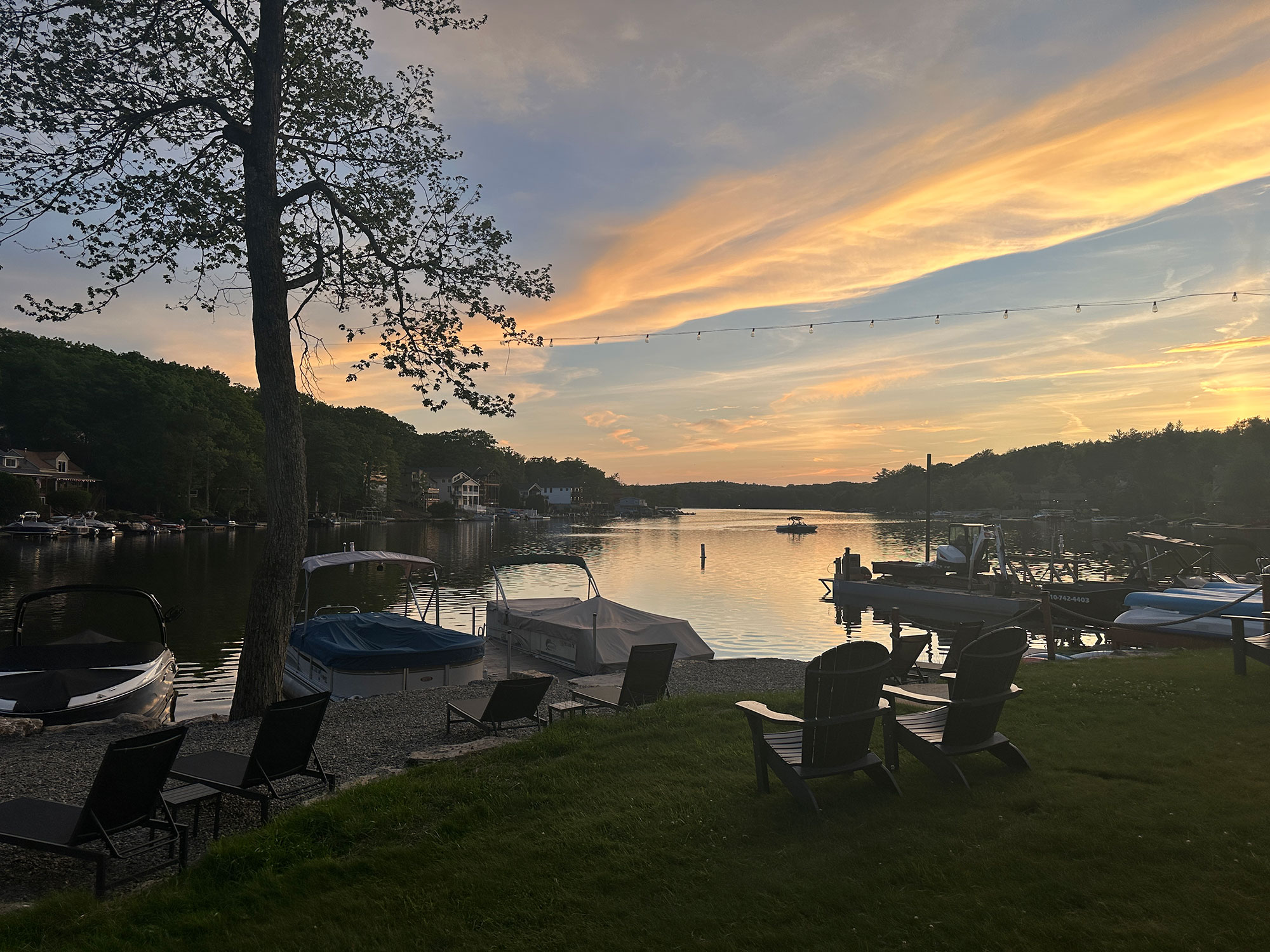 View of boats at a dock on Lake Harmony in Twilight.